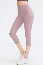 Lilac capri leggings with phone pocket detail and breathable fabric.