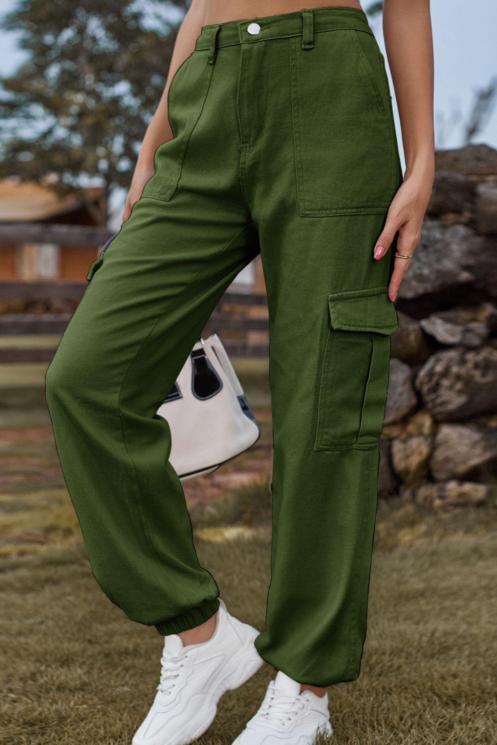 Army green cargo pants with multiple pockets and elastic cuffs.