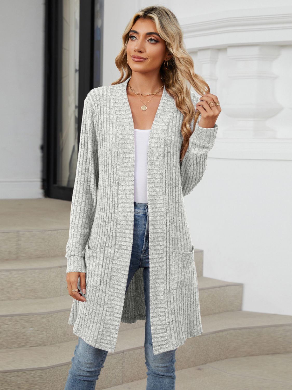 Light gray ribbed knit duster cardigan with pockets and open front.
