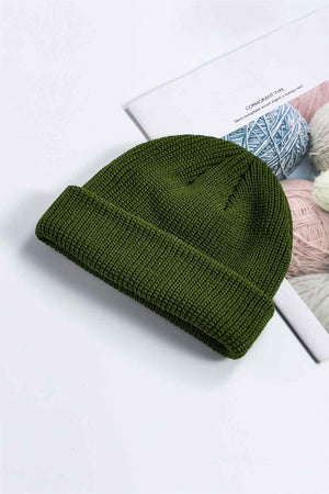 Olive green ribbed knit beanie with a turn-up cuff