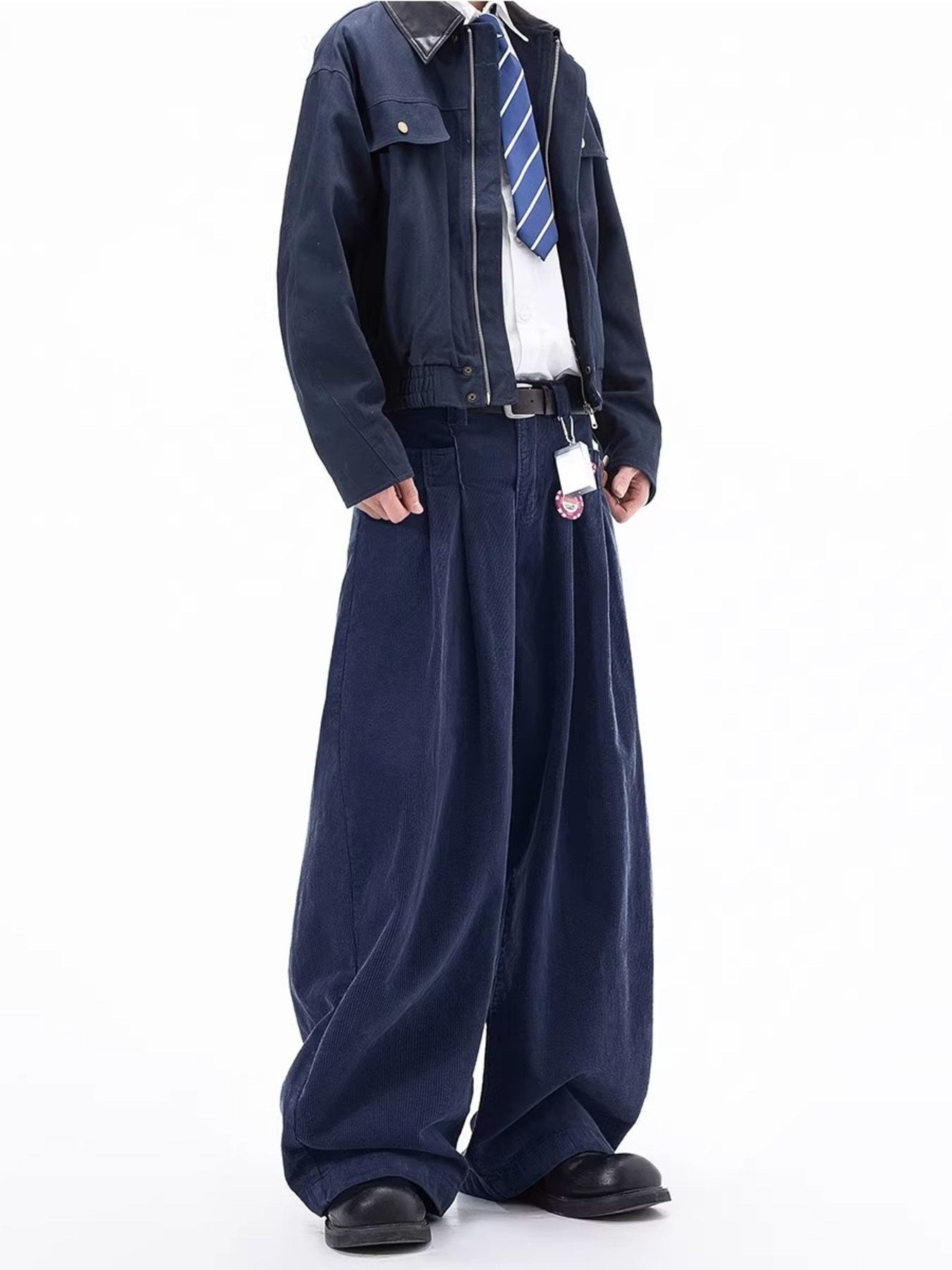 Men's navy blue corduroy wide leg sweatpants with a relaxed fit.