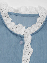 Light blue button-up blouse with white lace trim detail on collar and placket.