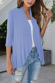Light blue waterfall cardigan with asymmetric hemline and 3/4 sleeves.