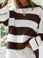 Striped oversized knit sweater in chocolate and white with a crew neck and bell sleeves.