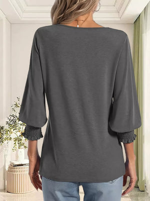 Dark gray maternity t-shirt with ruched 3/4 sleeves and elastic cuffs.