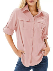 Pink roll-up sleeve button-up shirt with chest pockets and a zip detail