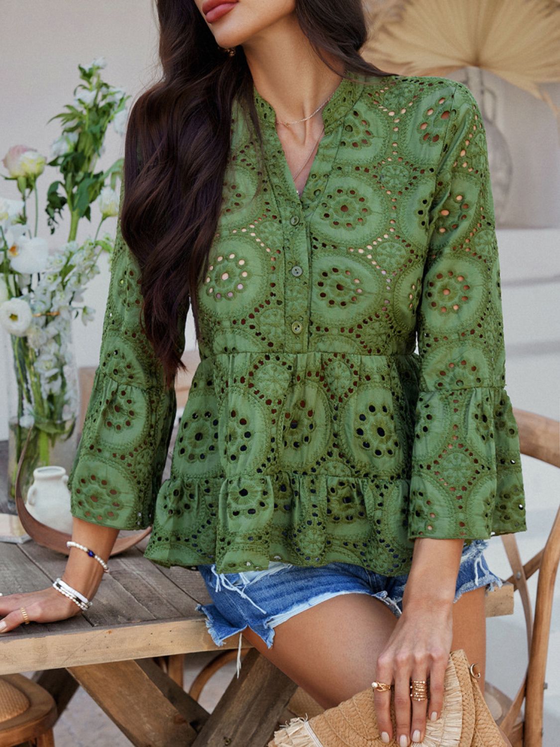 Moss eyelet embroidered peplum blouse with ruffles and bell sleeves