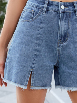 Light blue denim shorts with split front and frayed hem