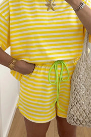 Yellow and white striped cotton two-piece set with drawstring shorts and short sleeve top.