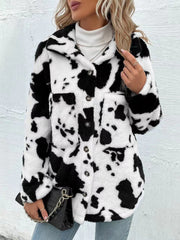 Cow print plush shacket with button front and chest pockets, styled with a white turtleneck.