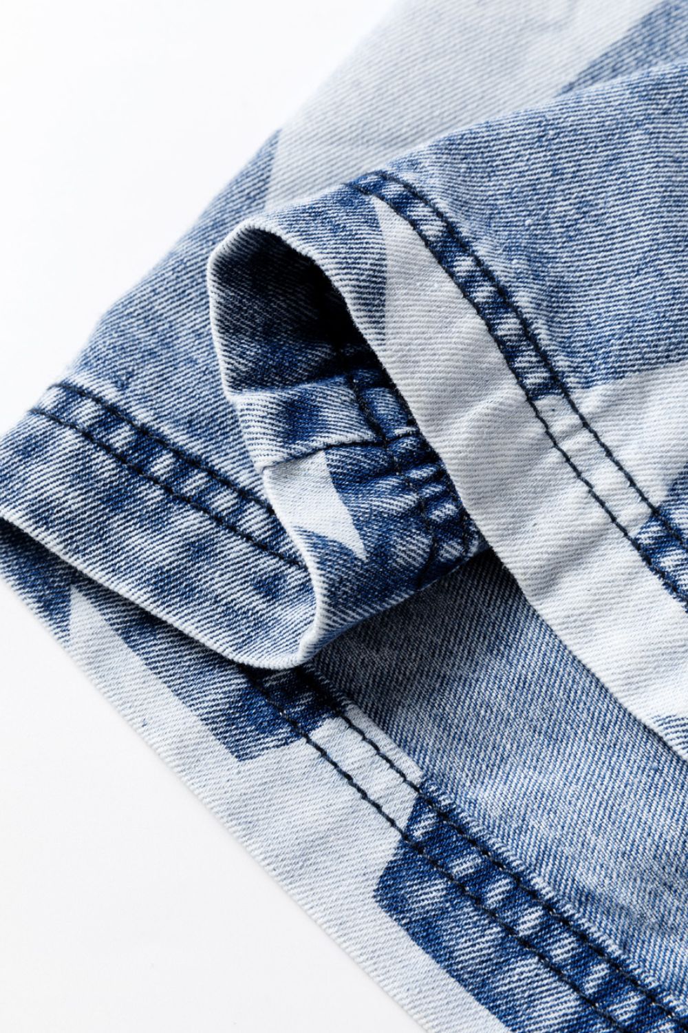 Cosmic Wash Star Print Palazzo Jeans in medium blue denim with a star pattern and visible stitching detail.