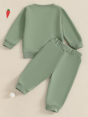 Green cotton baby outfit set with ribbed cuffs and waistband, featuring a bunny applique detail.