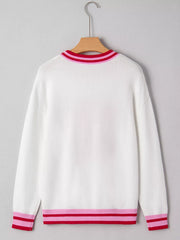 White round-neck sweater with striped ribbed collar, cuffs, and hem in pink and red.