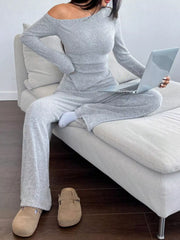 Light gray ribbed one-shoulder top and wide-leg pants set with a relaxed fit.