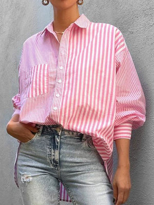 Pink and white striped oversized button-down shirt with pocket detail.
