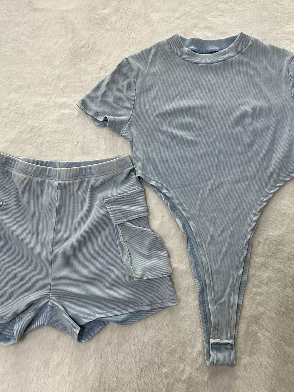 Sky blue ribbed two-piece set with crop top and cargo shorts with pockets