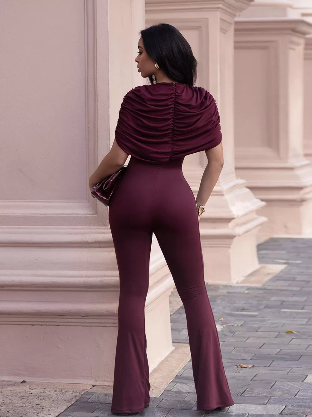 Burgundy ruched cap sleeve bodysuit with flared legs