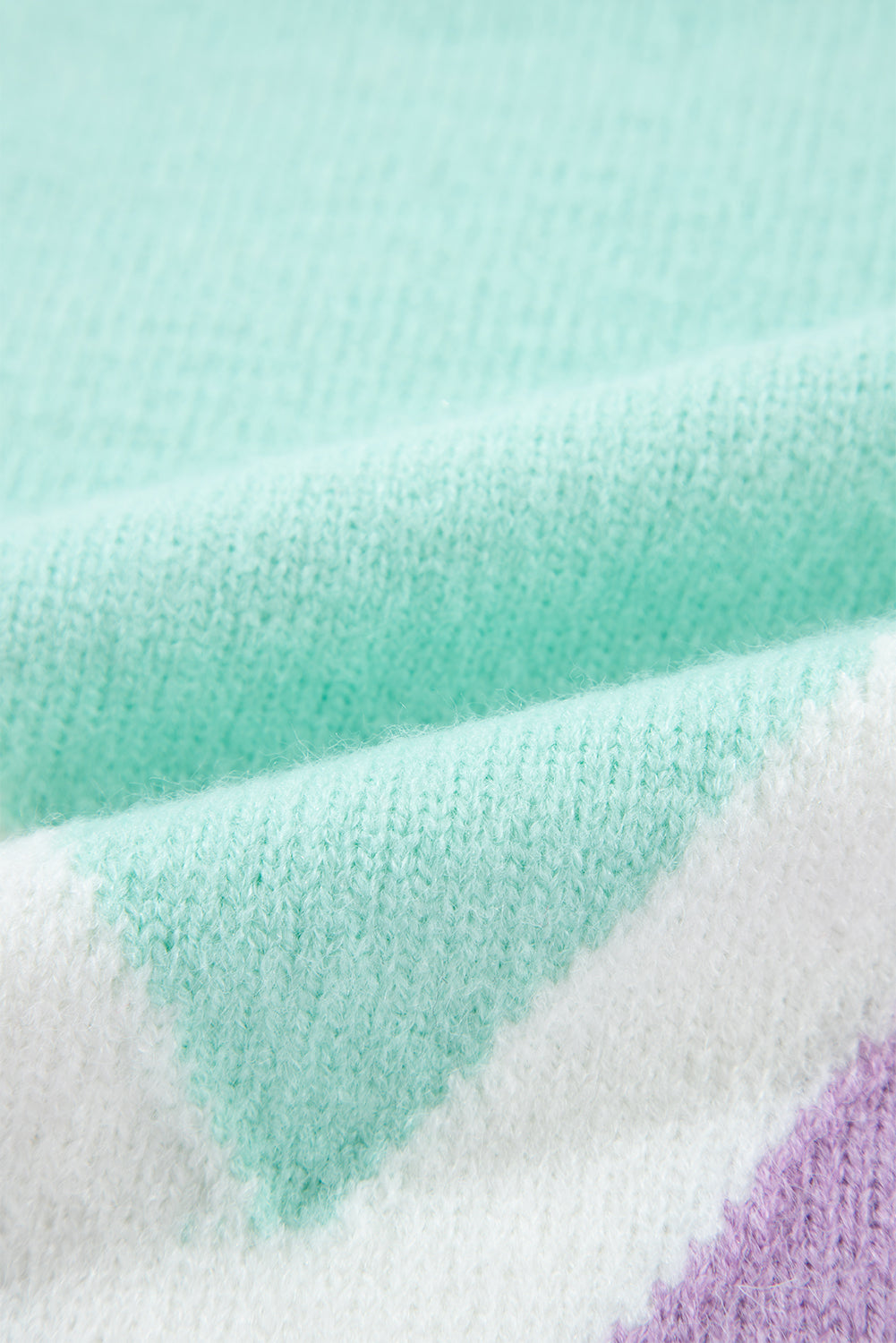 Chevron colorblock knit pullover sweater in lavender, white, and mint green acrylic.