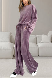Mauve velvet lounge set with wide sleeve top and drawstring pants.