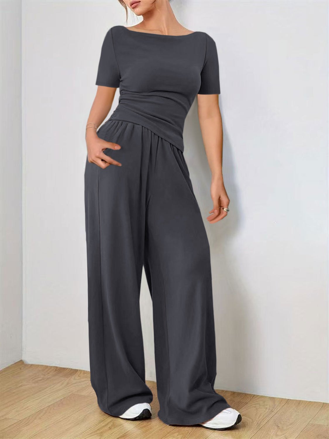 Boat neck jersey co-ord set in dark gray with wide-leg pants and short sleeves.