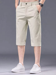 Men's apricot chino shorts with belt loops and pockets.