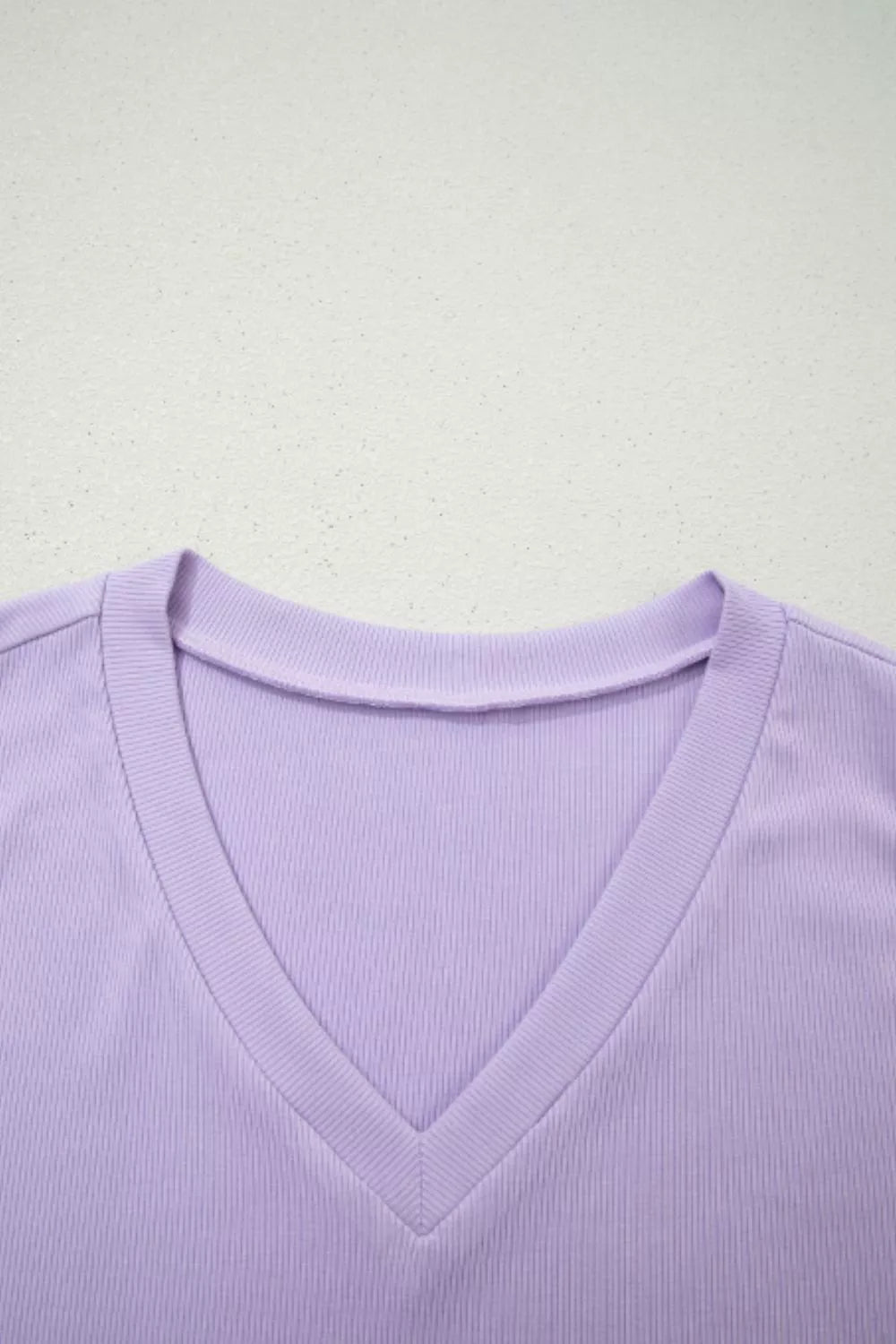 Lavender ribbed V-neck bodice detail of a maxi dress