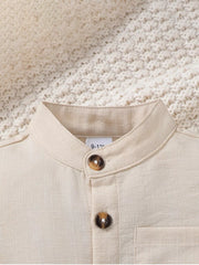 Beige linen blend baby shirt with mandarin collar and two button details.