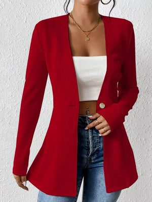Red single-button blazer with tailored fit and long sleeves, styled open over a white top.
