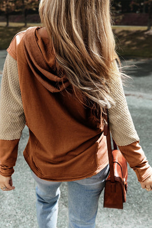 Hoodie with textured tan sleeves and caramel body, featuring a colorblock design.