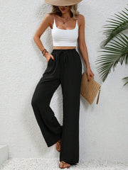 Black textured palazzo trousers with drawstring waist and wide leg