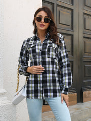 Black plaid overshirt with buttoned flap pockets and a collared neckline.