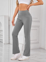 Gray flared leg activewear pants with pocket detail