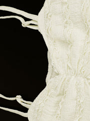 White textured sweetheart neck cami top with lace trim and tie straps.