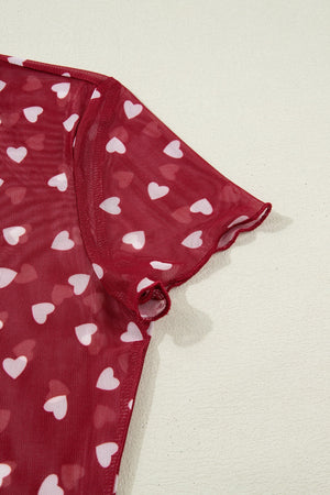 Deep Red sheer heart print t-shirt with lettuce edge sleeves.