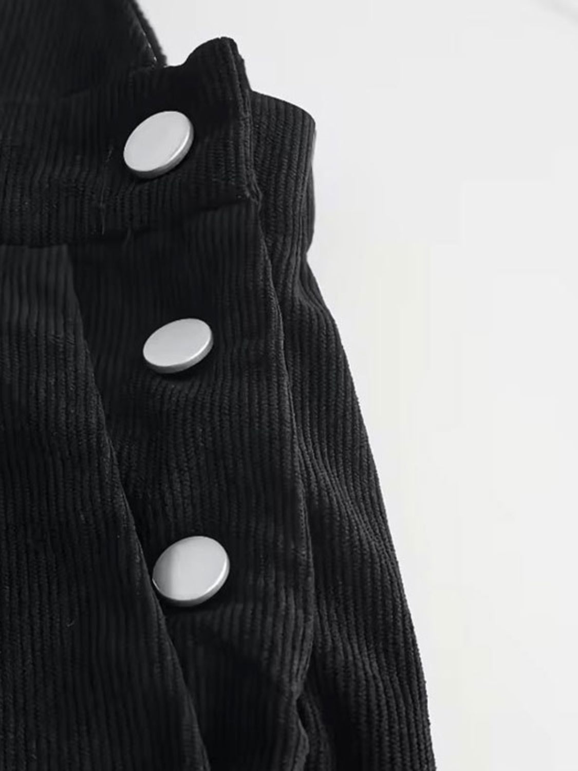 Black corduroy overalls with silver button details