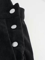 Black corduroy overalls with silver button details