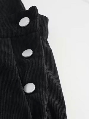 Black corduroy overalls with silver button details