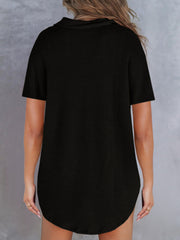 Black waffle knit polo shirt with button detail and short sleeves