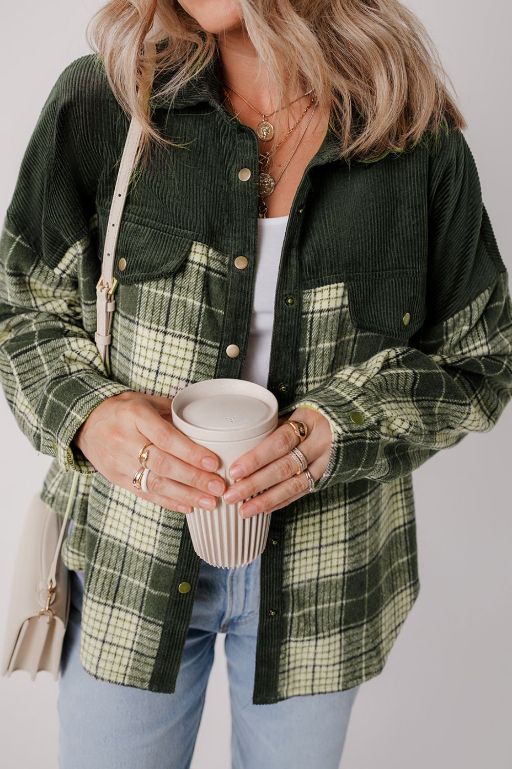 Corduroy yoke plaid overshirt in Black Forest with button front and collared neckline.