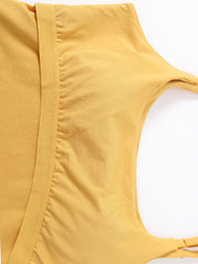 Mustard built-in bustier crop camisole with ruched detail and adjustable straps.