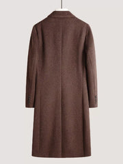 Wool blend double-breasted overcoat in brown with button detail on sleeves.
