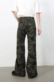Camo flare denim trousers in green camouflage with a casual, wide-leg cut.