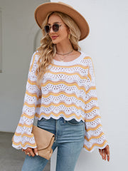 Scalloped crochet crop sweater in white with yellow and orange stripes, featuring bell sleeves.