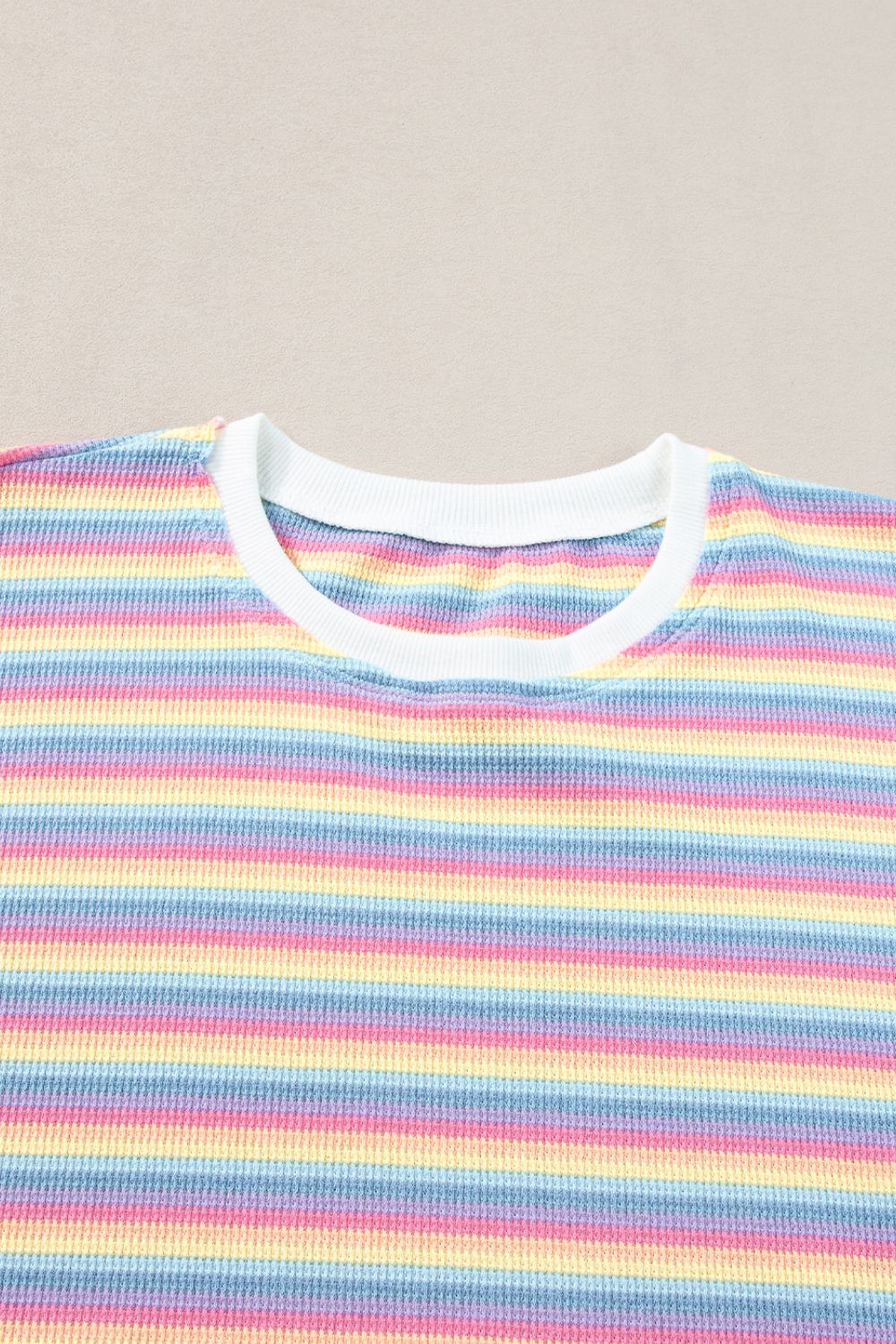 Rainbow stripe cotton jumpsuit with crew neck and ribbed texture