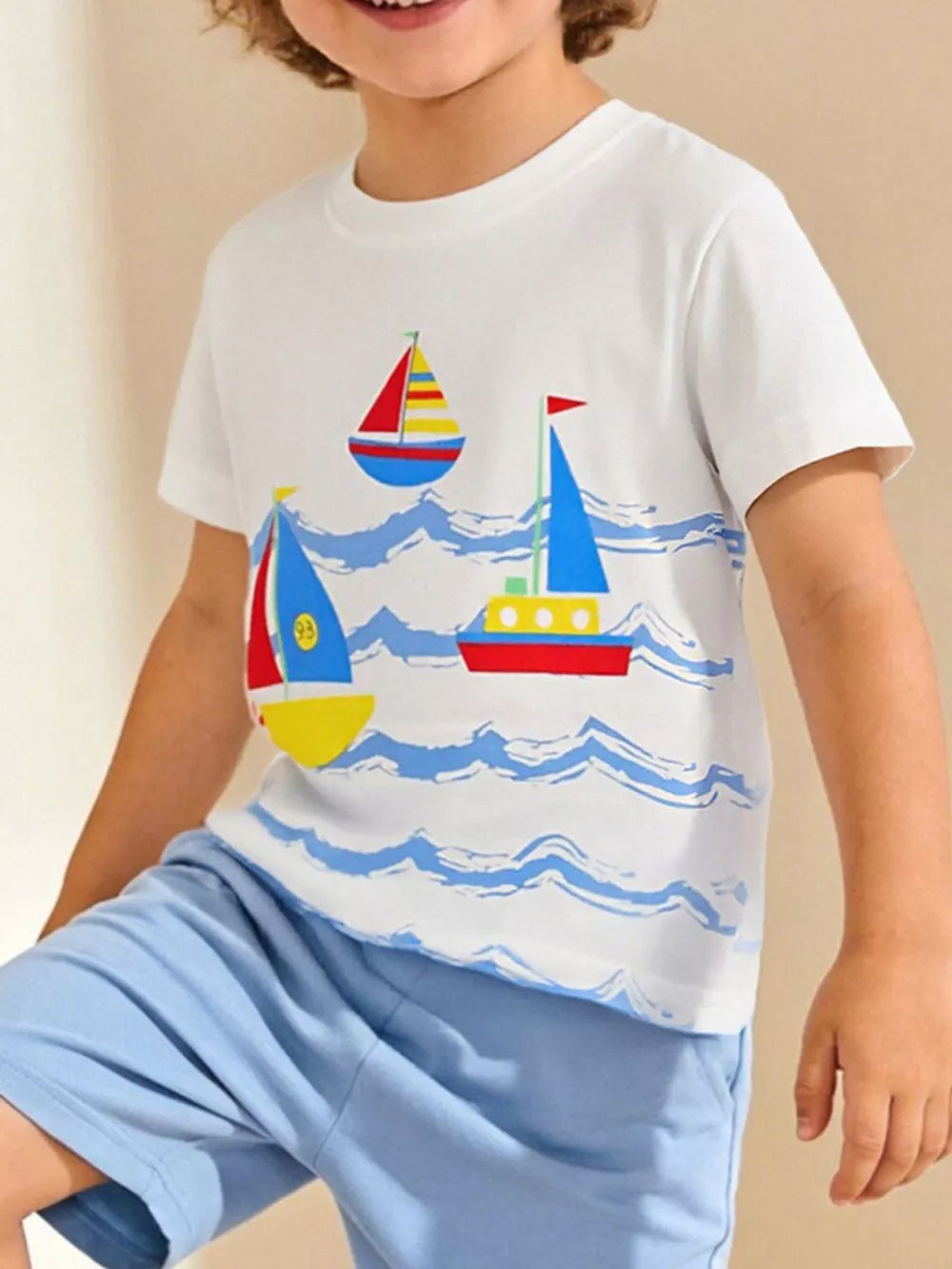 Toddler cotton t-shirt, white with nautical sailboat print.