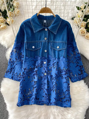 Blue denim jacket with lace sleeves and floral detail