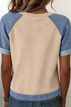 Color block t-shirt with tan body, blue denim sleeves, and round neckline.
