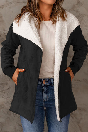 Black suede-effect jacket with sherpa collar and lining, open front, and pockets.