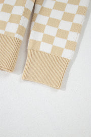 Tan and white checkerboard knit polo sweater with ribbed cuffs and hem.