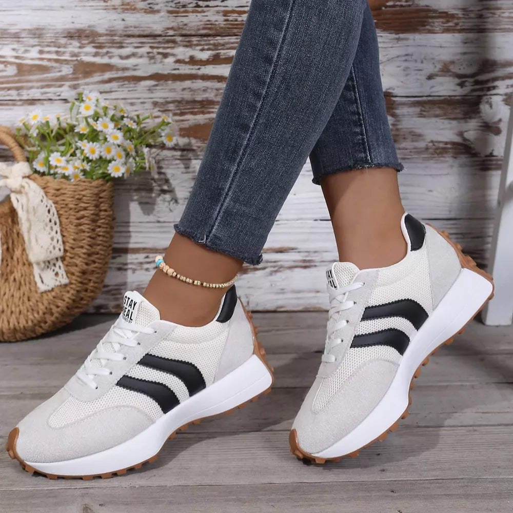 Lace Up Round Toe Sneakers in Red, model styling view